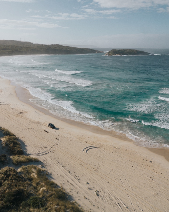 Pale sand and turquoise surf at Muttonbird Beach